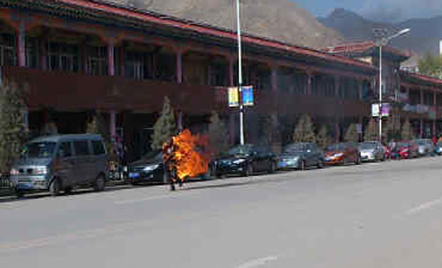 Dorje Rinchen ablaze after he set fire to himself today (October 23). Dorje Rinchen ablaze after he set fire to himself today (October 23).