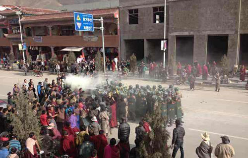 Troops are seen closing in on Dorje Rinchen's body after he has self-immolated. Troops are seen closing in on Dorje Rinchen's body after he has self-immolated.